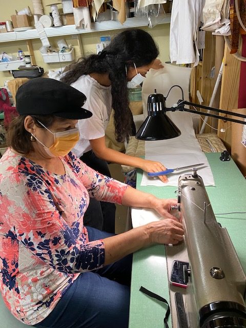 mother daughter sewing masks
